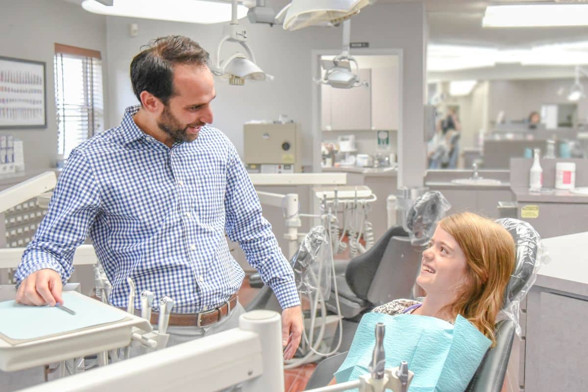 Dr. Rosenberg caring for a pediatric patient at smile experience orthodontics in pompton plains new jersey